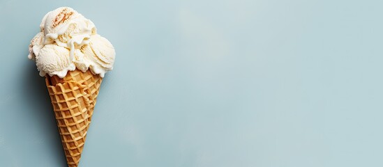 Copy space image of a top down view of a delicious sundae made with homemade vanilla ice cream and served in crispy waffle cones