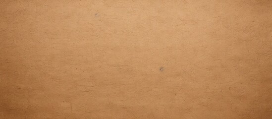 Fototapeta premium A textured background of recyclable brown craft paper with a cardboard like sheet providing ample space for adding text or images