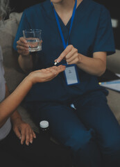 Doctors are giving advice on medication to patients in hospital examination rooms, treating diseases from specialists and providing targeted treatment. Concepts of medical treatment and specialists.