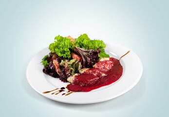 Barbecue grilled beef meat on a plate.