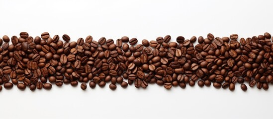 A top down copy space image of a Christmas tree crafted from roasted coffee beans on a white background ready for your messages