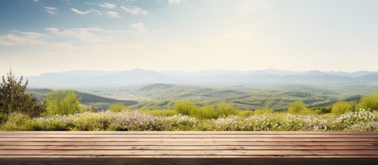 A springtime panorama of a sun filled landscape with a wooden table in the foreground providing ample copy space for images