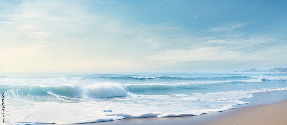 Poster A serene seaside scene with frothy waves crashing onto the sandy beach creating a tranquil atmosphere for a calming vacation Copy space image