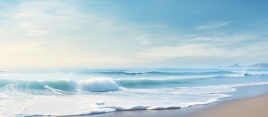 A serene seaside scene with frothy waves crashing onto the sandy beach creating a tranquil atmosphere for a calming vacation Copy space image