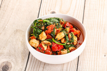 Chicken with tomato and spinach