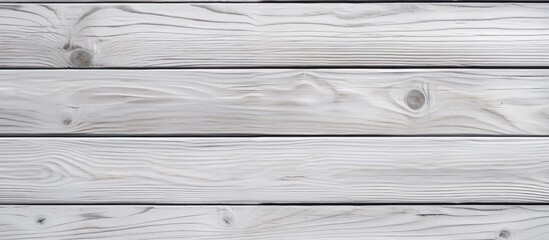 Fototapeta premium A wood plank texture in white color suitable for use as a background with space for copy