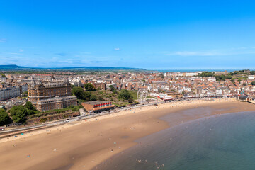 Aerial drone photo of the beach front in the town of Scarborough in North Yorkshire, England UK...