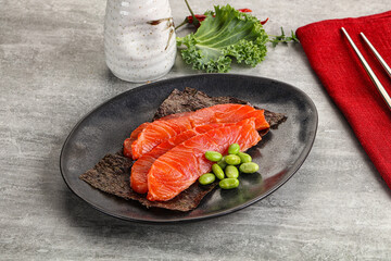 Sliced salmon sashimi in the plate