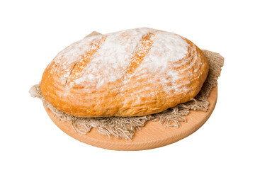 Freshly baked delicious french bread with napkin isolated on white background top view. Healthy white bread loaf