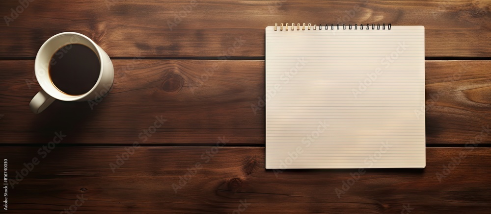 Poster Top view of a wooden table with a notepad that has To Do List written on it and a pen beside it There is empty space for text in the image. with copy space image. Place for adding text or design