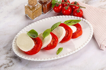 Italian caprese salad with mozzarella