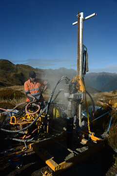 drilling a hole on the summit