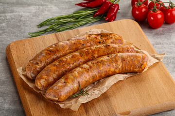 Raw sausages with spices and herbs