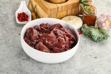 Raw uncooked chicken liver in the bowl