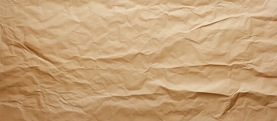 Fototapeta premium A rough and wrinkled copy space image featuring a beige brown paper background