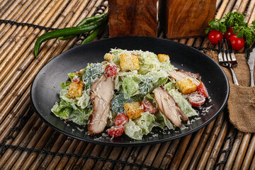 Caesar salad with chicken and romano