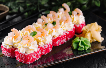 Gourmet sushi platter with shrimp and caviar
