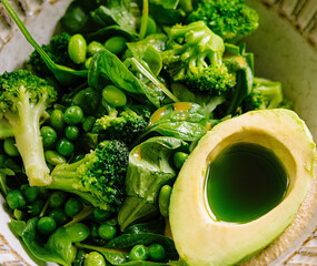 Fresh green salad with avocado and seasonal vegetables