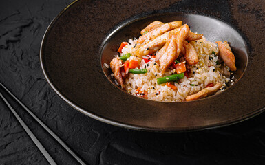 Asian chicken fried rice on elegant plate