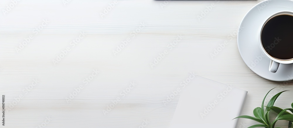 Poster the top down view of a white office desk showcases essential elements like a laptop smartphone work 