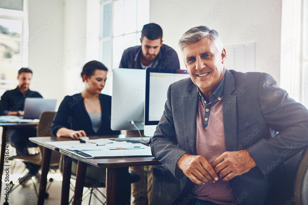 Poster mature man, portrait and happy in office with computer for research and product development for comp