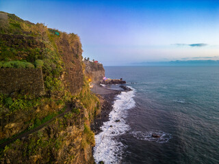 Scenic coastal landscape featuring cliffs and tranquil waters. Madeira, Portugal