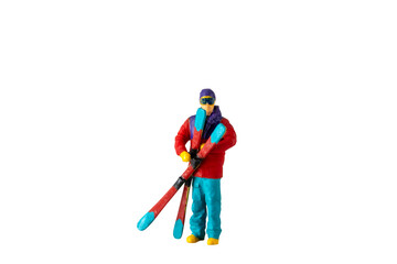 Miniature people , A skier full length Isolated with clipping path