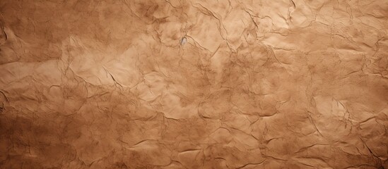 Fototapeta premium An abstract background featuring a textured mulberry paper with a brown color scheme The image provides ample copy space