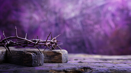 Crown of thorns wooden cross and nails on purple background