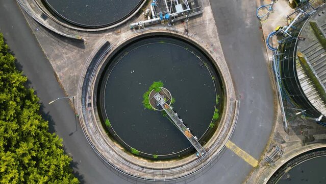 Drone shot above a waste water treatment plant of a small town in the United Kingdom