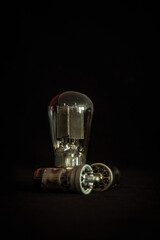 ELECTRON TUBE - A device in a closed glass housing used in electronic circuits to control the flow...