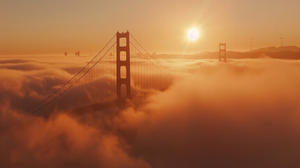 Fototapeta premium The sun rises behind the fog-covered Golden Gate Bridge, casting a warm, golden glow over the misty landscape as the city awakens to a new day. 