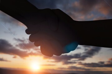 handshake silhouette. business concept at sunset