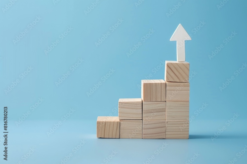 Poster wooden blocks with an arrow on top. useful for business and direction concepts