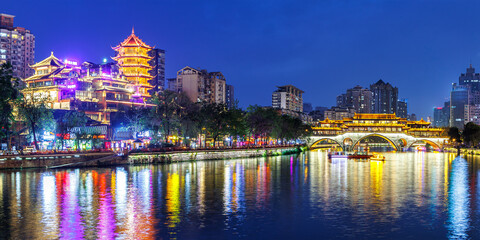 Chengdu Anshun Bridge over Jin River with Pagoda at night panorama in Chengdu, China