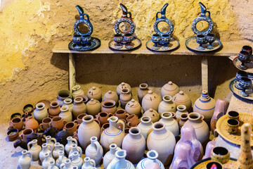 Assortment of traditional Cappadocian pottery, vibrant decorative pieces and various sizes. Home...