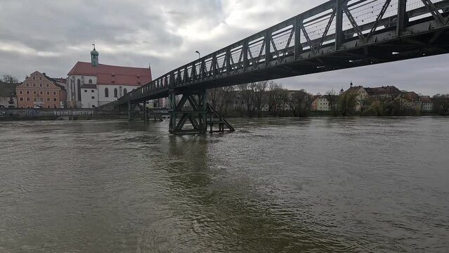 St. Oswald's Church and the Iron Bridge on the Danube River in Regensburg, Bavaria, Germany