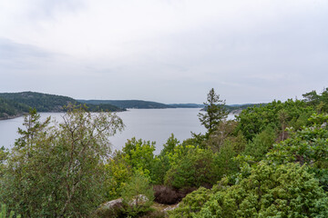 Naklejka premium View of a serene body of water in Munkkyrkan, Smoegen, Sweden