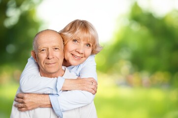 Fototapeta premium Happy active old senior couple hugging in park