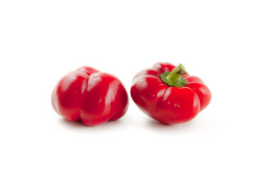 Two red bell pepper isolated on white background with clipping path. .