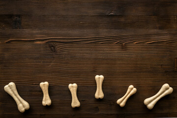Dog food and treats - chew bones pattern, top view