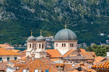View of the Mediterranean old town and Dome of St. Nicholas Church towering over the red tiled...