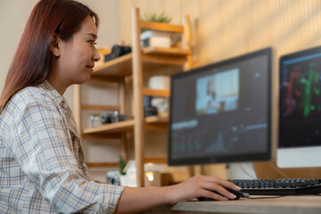 a young woman editing Video