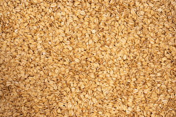 Oat-flakes as a background. Top view.