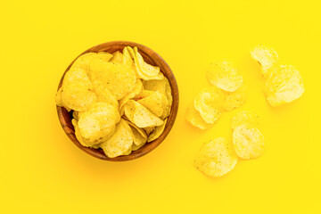 Oven backed low calorie potato chips. Snacks background, top view