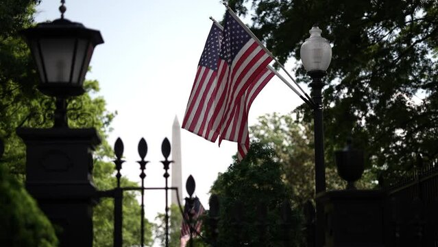 US flags on a post outside the presidents White House in Washington, DC.