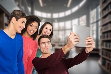 Obraz premium Happy international young students studying together