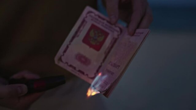 A man sets fire to his international passport. Renunciation of citizenship