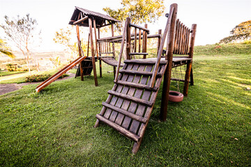 old wooden playground, abandoned, rustic park without children, Brazil, state of Minas Gerais