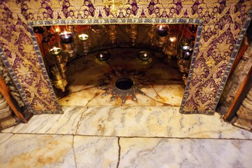 Bethlehem, Israel, mark of the birthplace of Jesus Christ by the Blessed Virgin Mary in Bethlehem, beneath altar in the Nativity Grotto. 